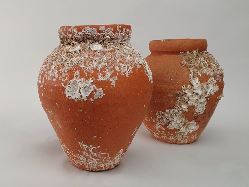 Pair of antique terracotta Octopus Traps or Pots