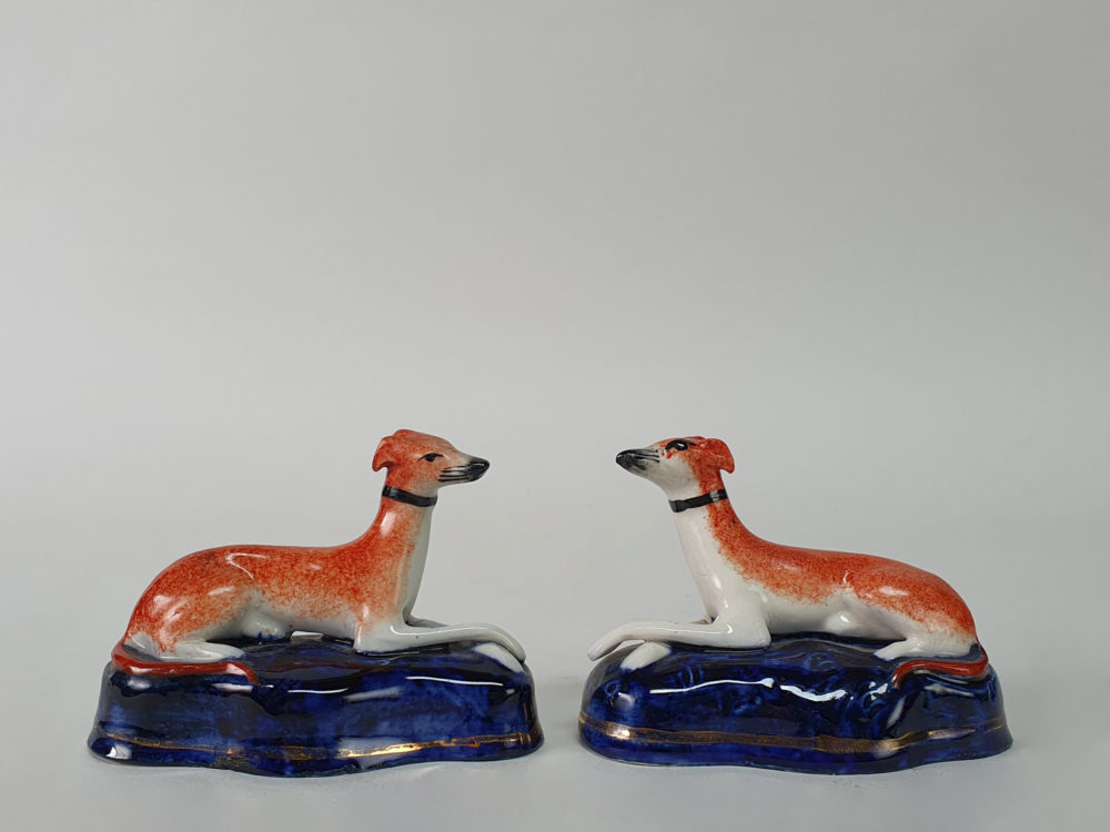 Pair of miniature antique ceramic Staffordshire Greyhounds