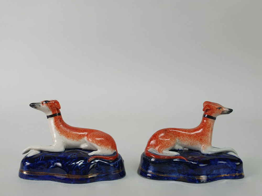 Pair of miniature antique ceramic Staffordshire Greyhounds
