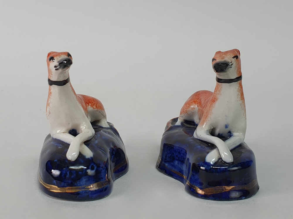 Pair of miniature antique ceramic Staffordshire Greyhounds