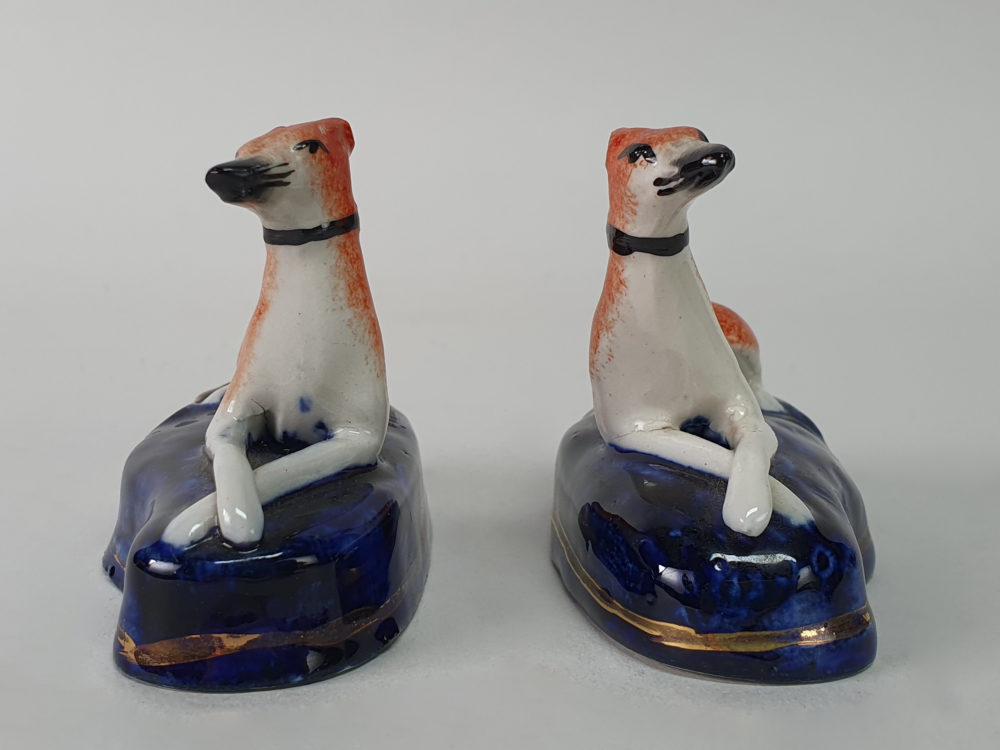 Pair of miniature antique ceramic Staffordshire Greyhounds