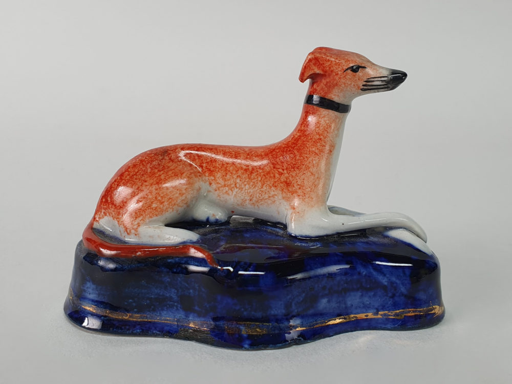 Pair of miniature antique ceramic Staffordshire Greyhounds