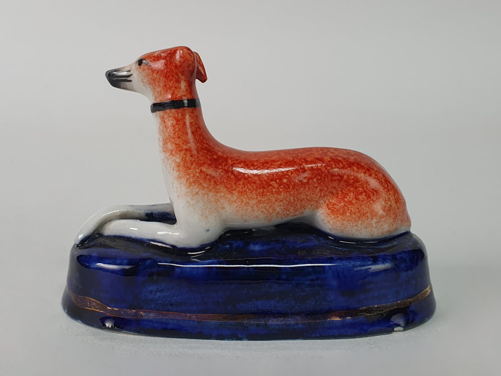 Pair of miniature antique ceramic Staffordshire Greyhounds