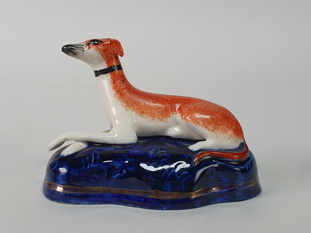 Pair of miniature antique ceramic Staffordshire Greyhounds