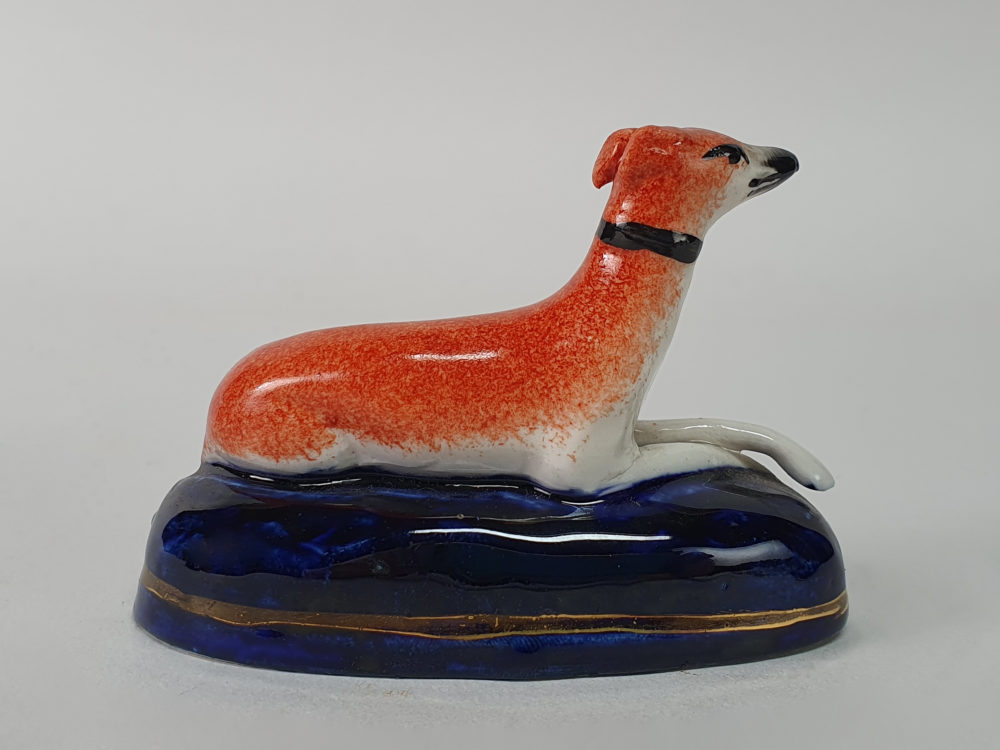 Pair of miniature antique ceramic Staffordshire Greyhounds