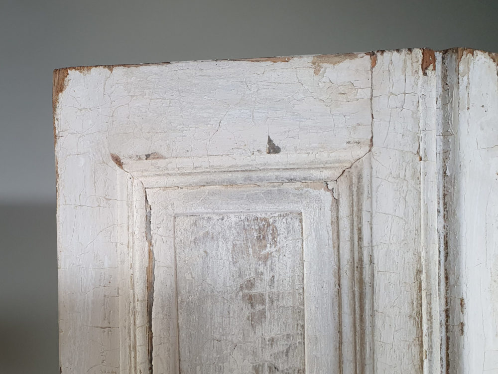 Two pairs of tall panelled antique Shutters in original cream paint