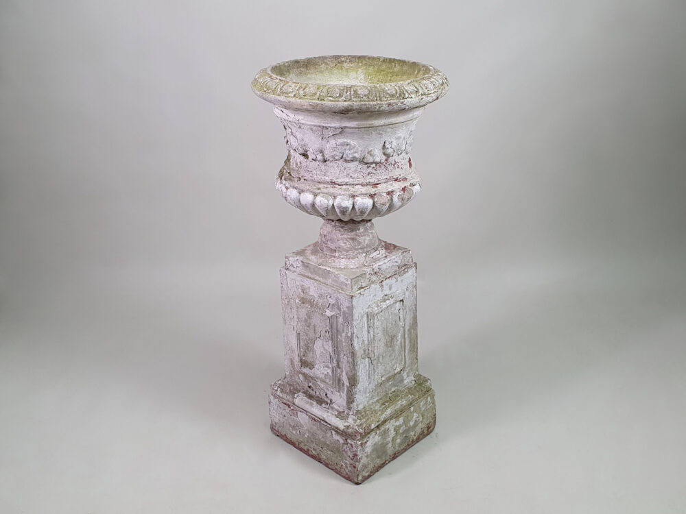 Pair of tall well weathered antique Garden Urns on Plinths