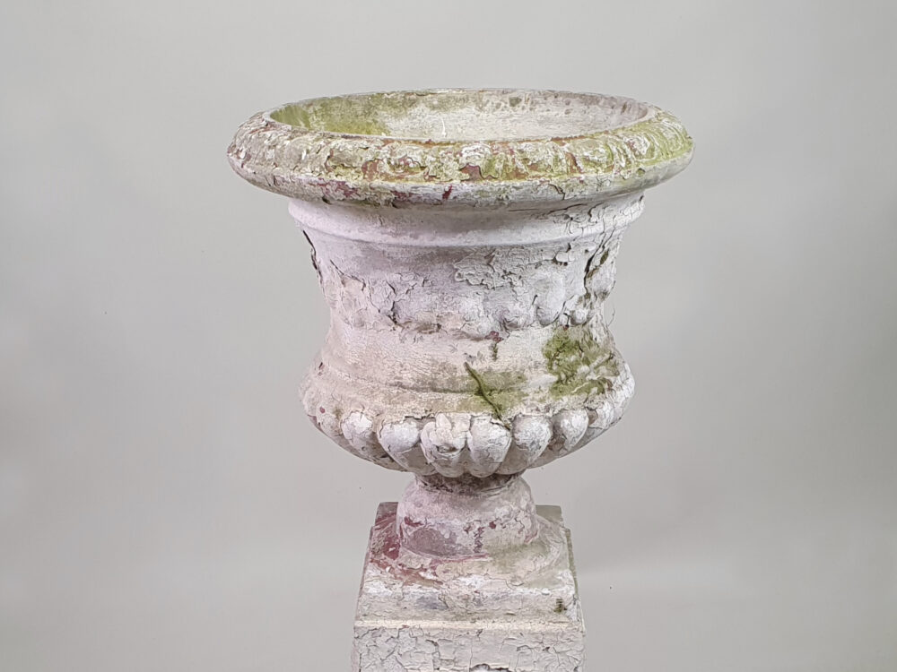 Pair of tall well weathered antique Garden Urns on Plinths