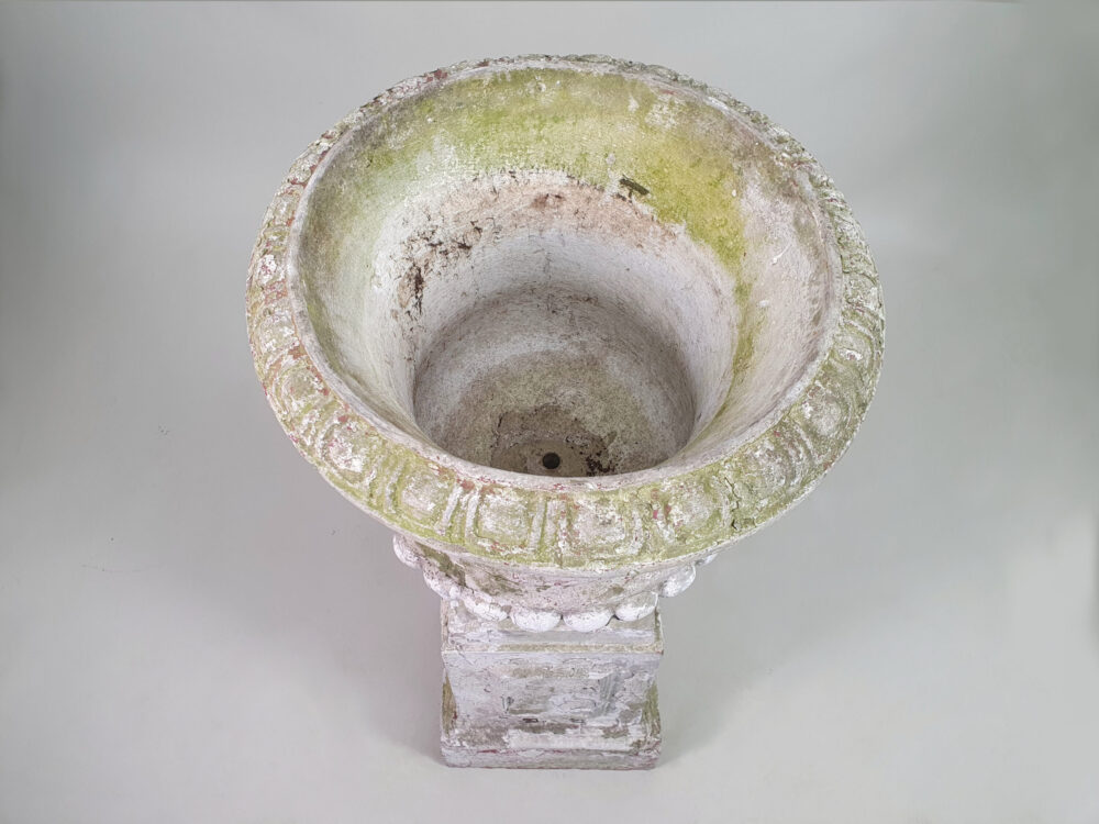 Pair of tall well weathered antique Garden Urns on Plinths