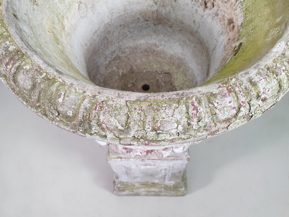 Pair of tall well weathered antique Garden Urns on Plinths