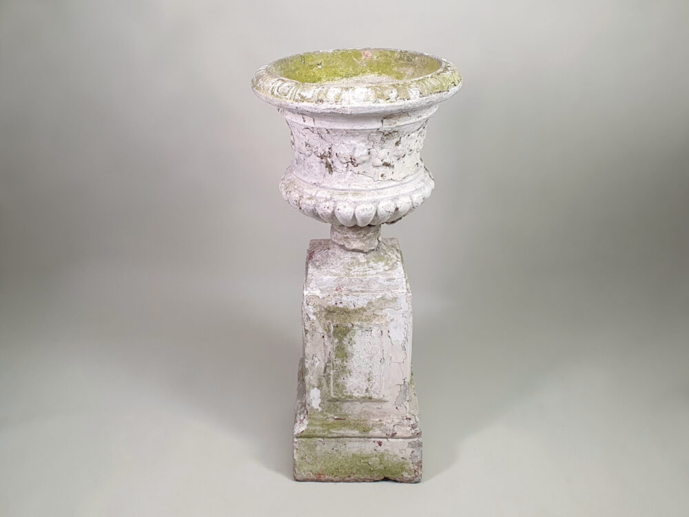 Pair of tall well weathered antique Garden Urns on Plinths