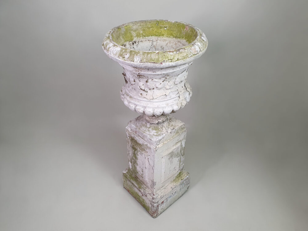 Pair of tall well weathered antique Garden Urns on Plinths