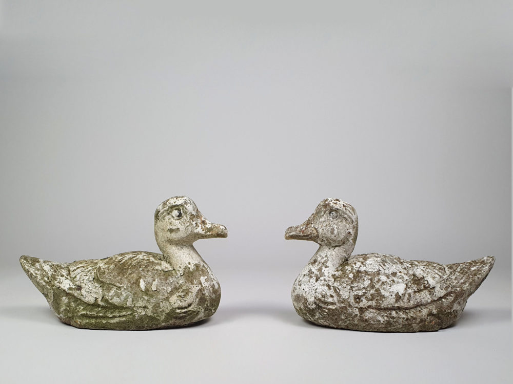 Pair of well weathered vintage Garden Ducks