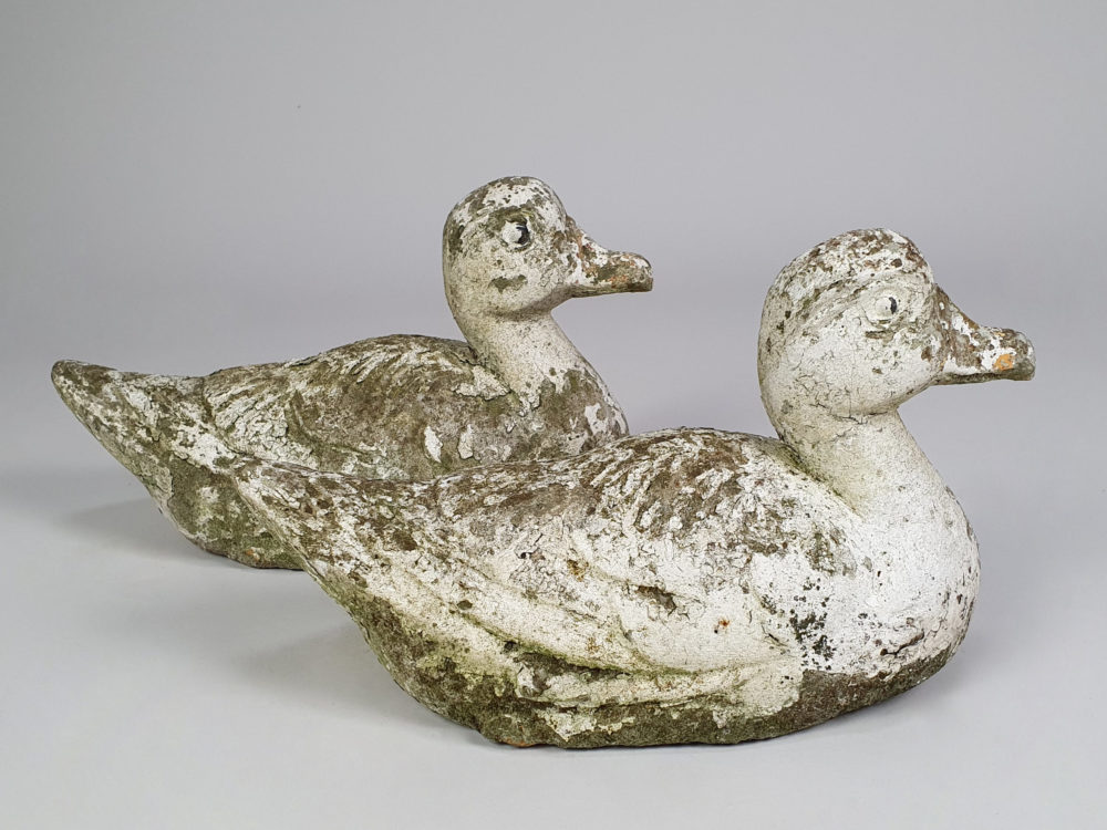 Pair of well weathered vintage Garden Ducks