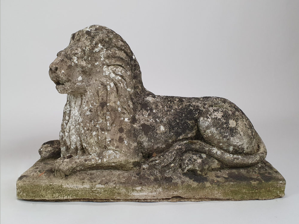 Pair of well worn antique garden Lions