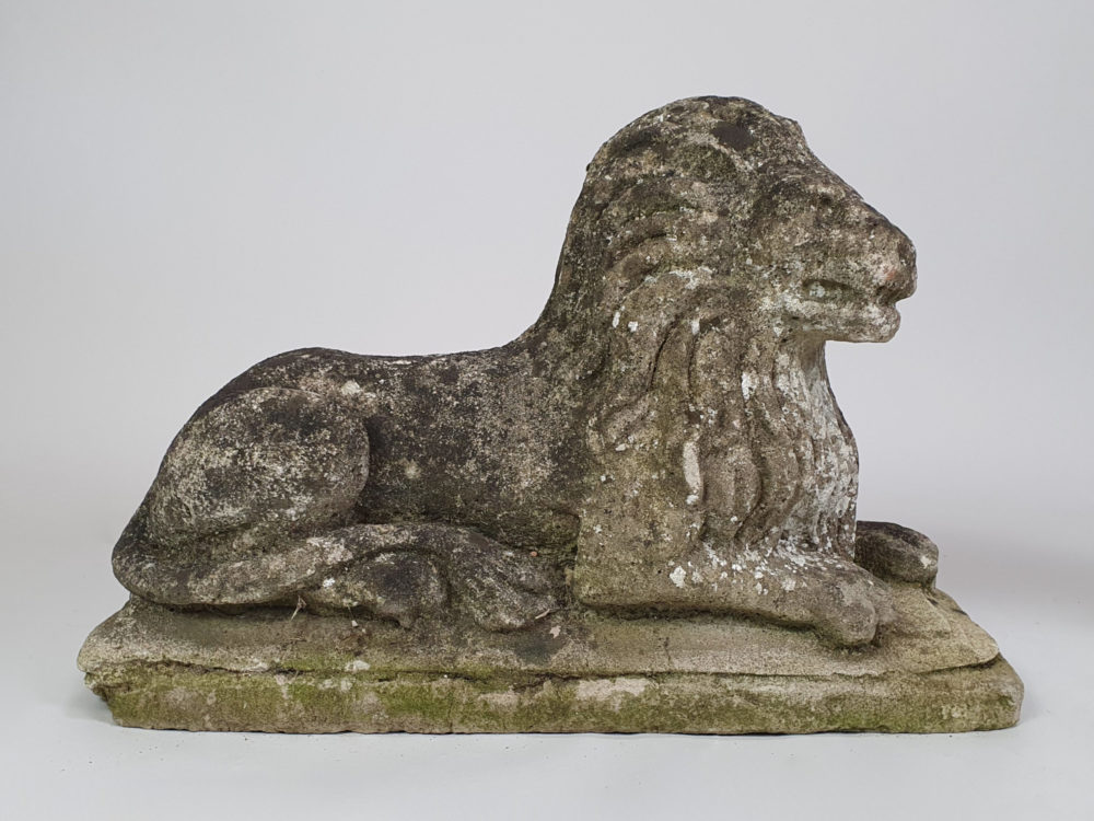 Pair of well worn antique garden Lions