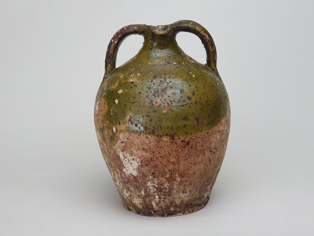 Rustic pottery French Olive Jar or Amphora with a worn green glaze