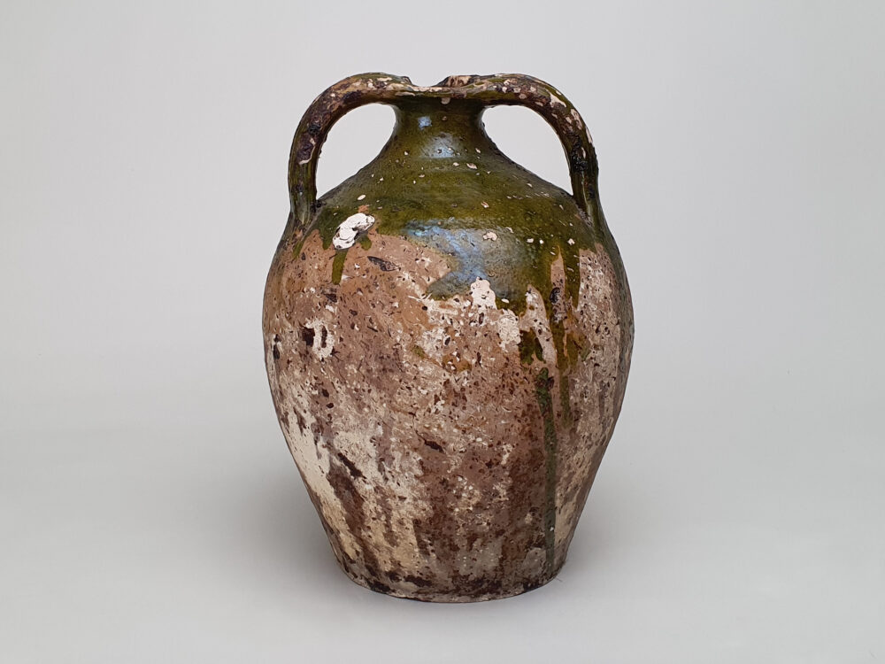 Rustic pottery French Olive Jar or Amphora with a worn green glaze