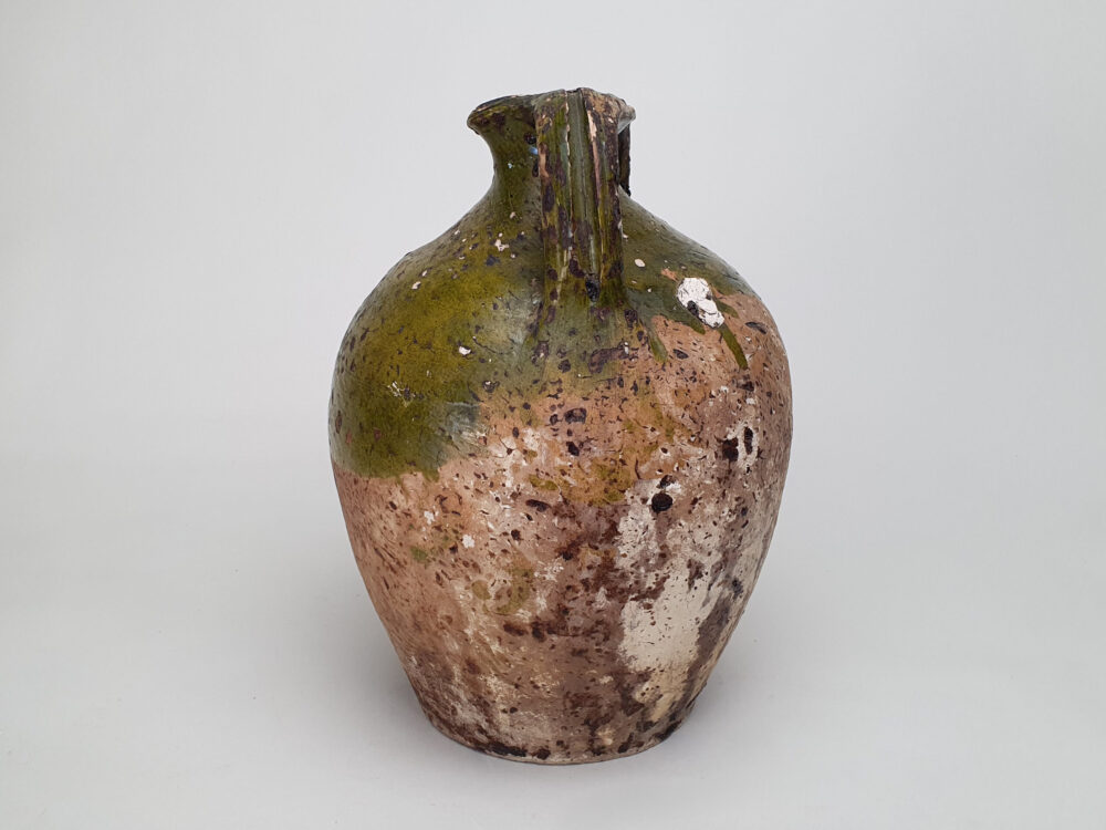 Rustic pottery French Olive Jar or Amphora with a worn green glaze