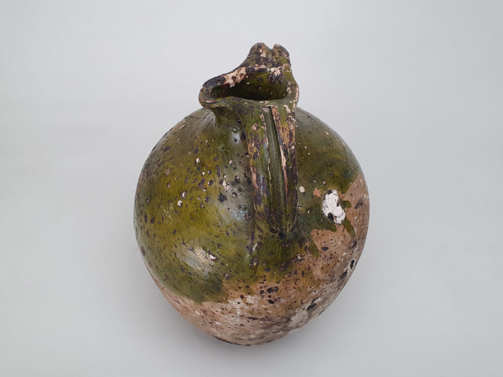 Rustic pottery French Olive Jar or Amphora with a worn green glaze