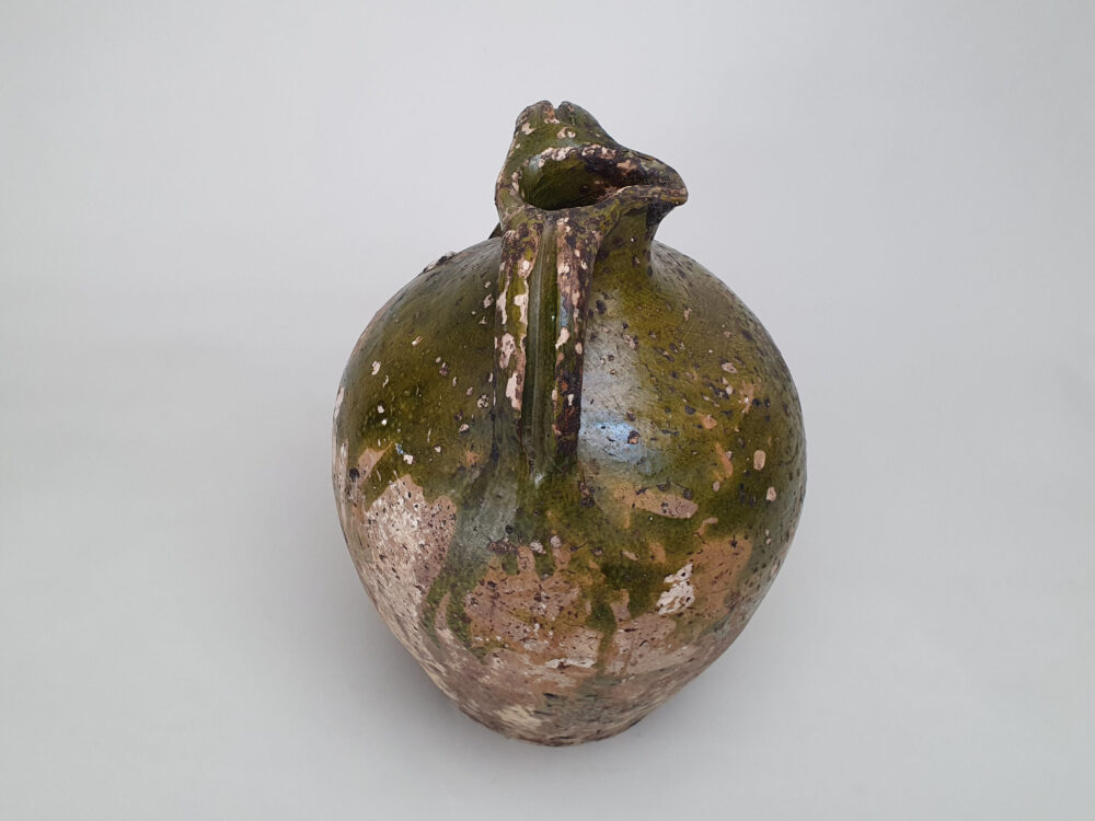 Rustic pottery French Olive Jar or Amphora with a worn green glaze