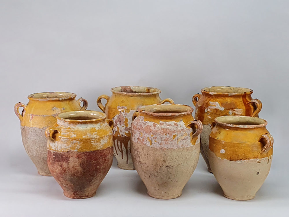 Selection of 19th century antique rustic pottery Confit pots