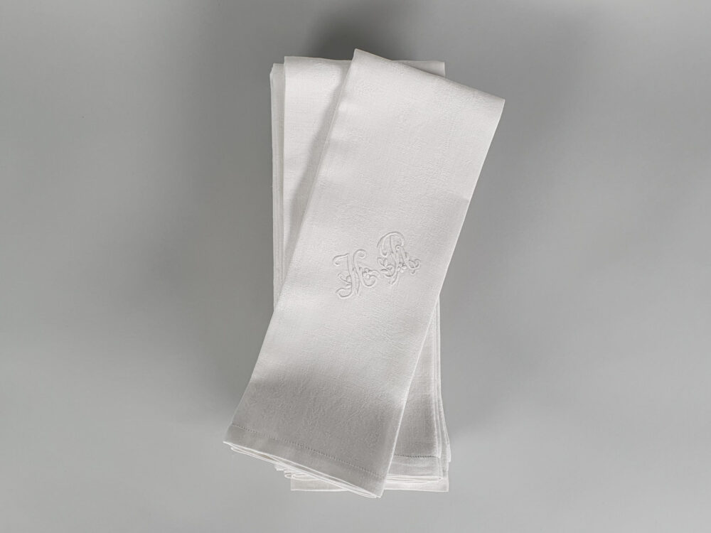 Set of 10 white French Napkins or Serviettes with antique embroidery monograms H R or possibly MR