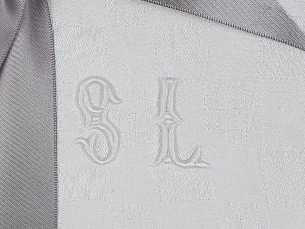 Set of 4 white antique textile Napkins, monogrammed with the initials S L