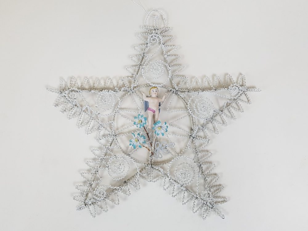Star shaped antique Bead Work Wreath with Cherub
