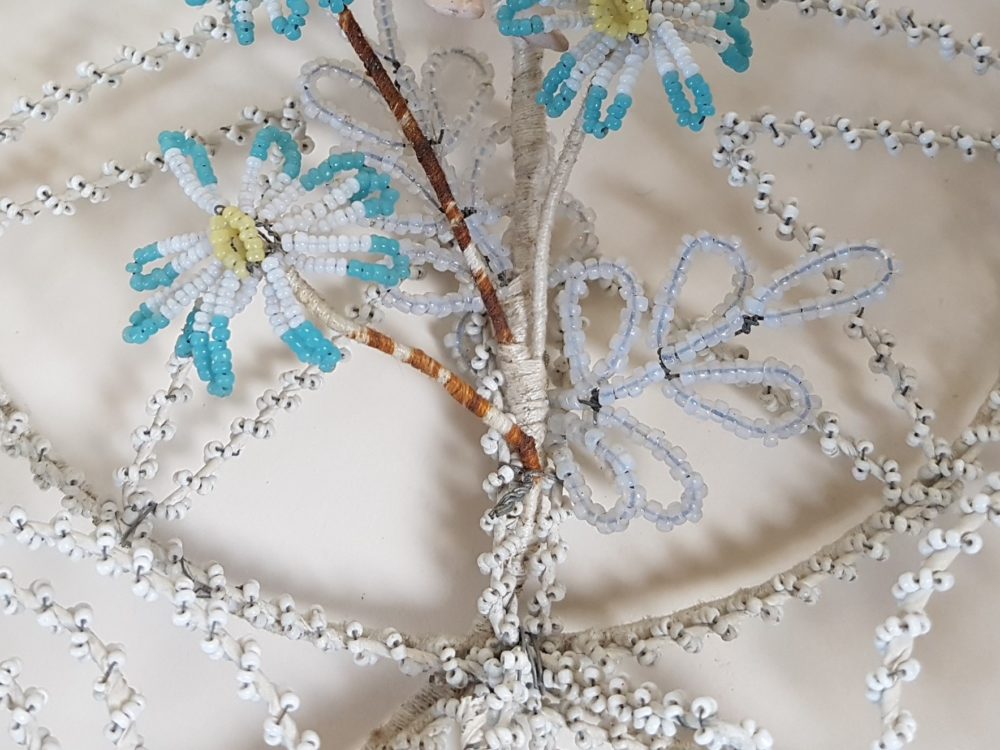 Star shaped antique Bead Work Wreath with Cherub