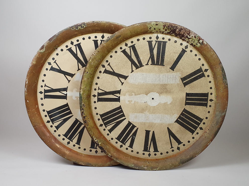 Two sides of a French clock maker's shop Trade Sign