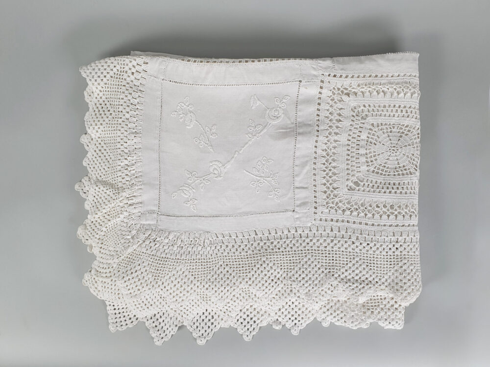 White antique Bedcover with embroidered and crocheted panels