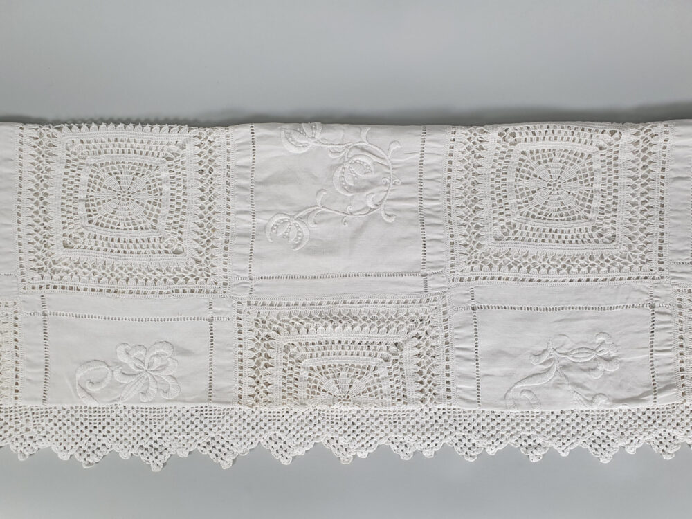 White antique Bedcover with embroidered and crocheted panels