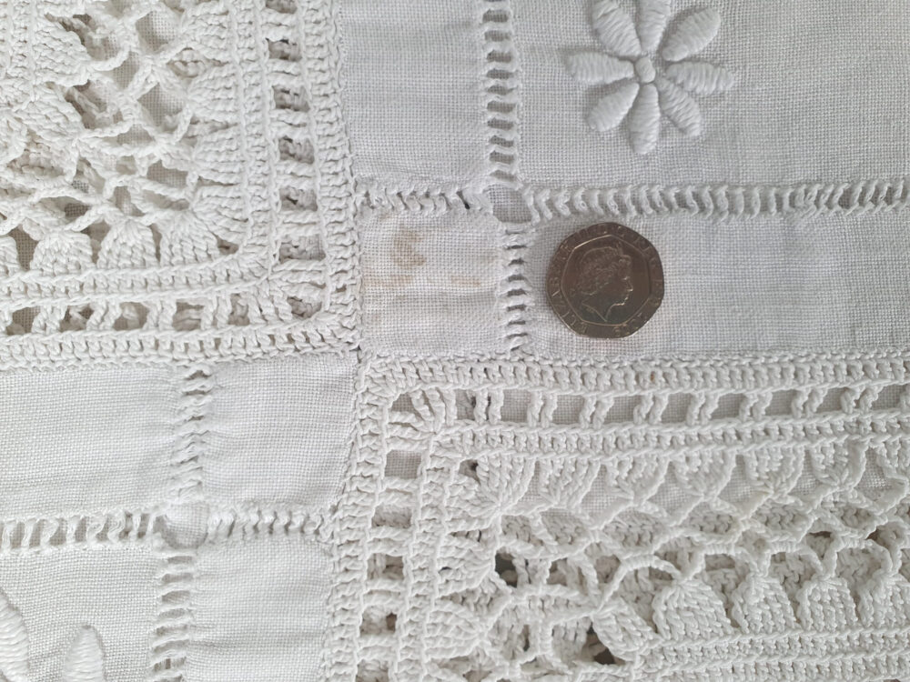 White antique Bedcover with embroidered and crocheted panels