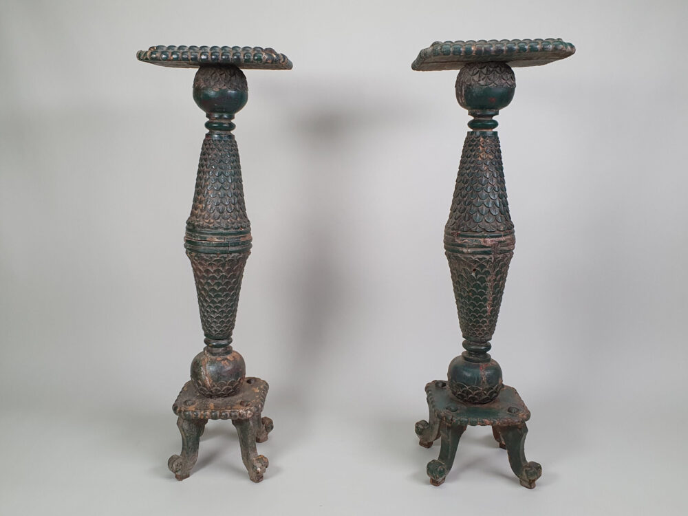 A pair of decorative antique Torchères in original green paint