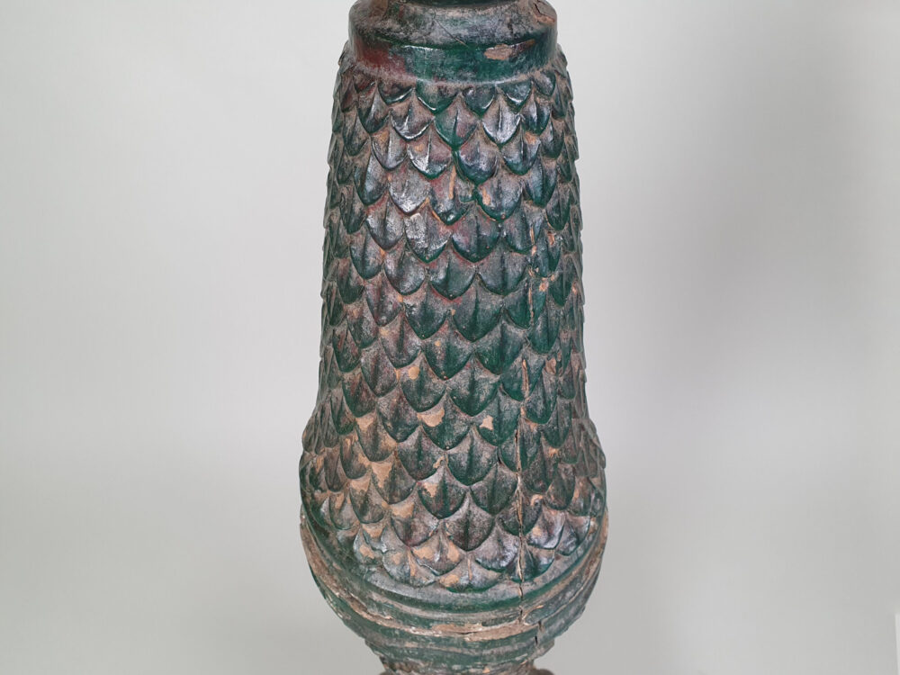 A pair of decorative antique Torchères in original green paint