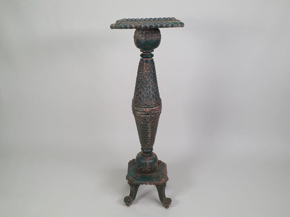 A pair of decorative antique Torchères in original green paint
