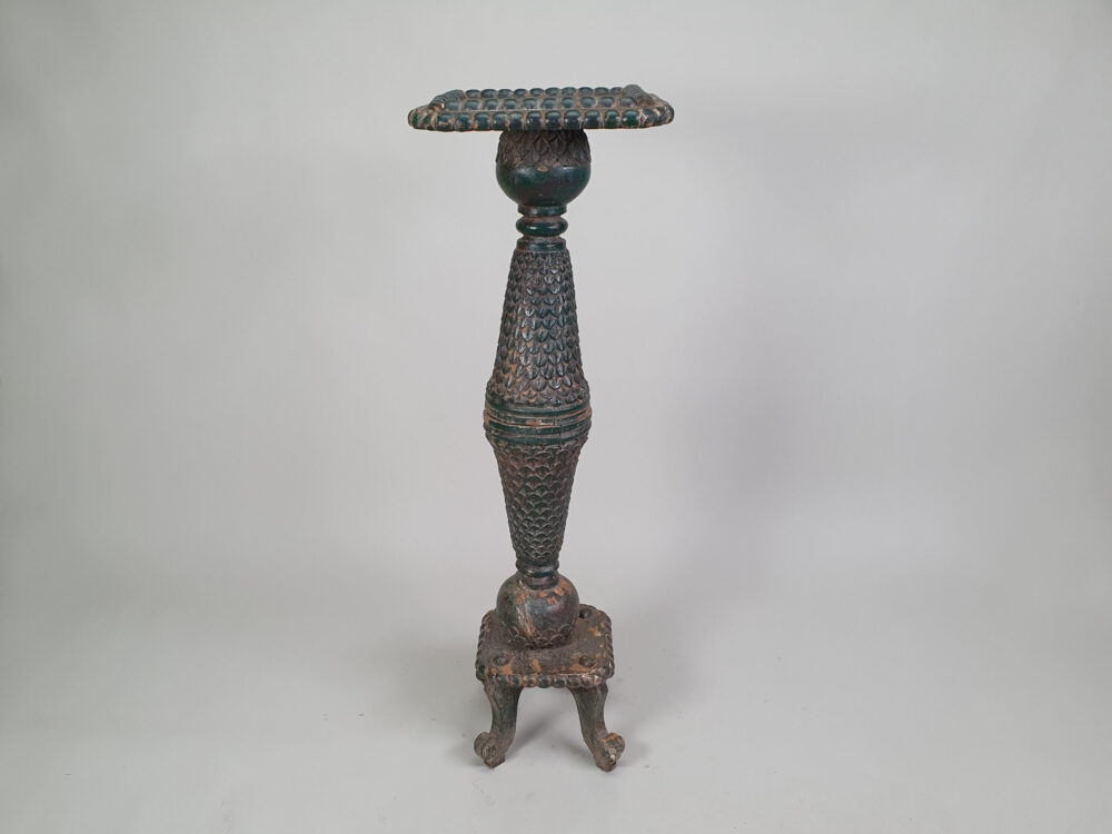 A pair of decorative antique Torchères in original green paint