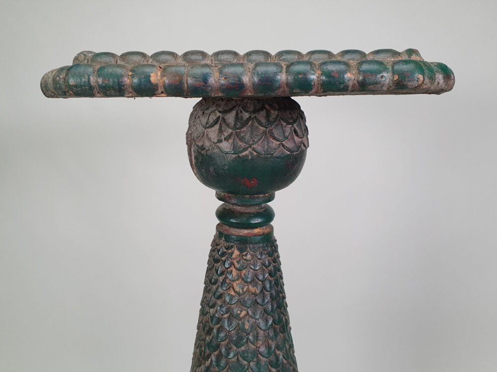 A pair of decorative antique Torchères in original green paint