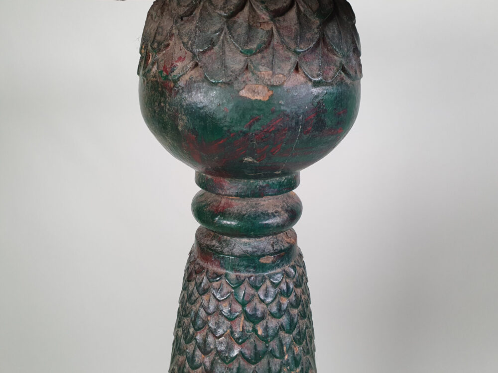 A pair of decorative antique Torchères in original green paint