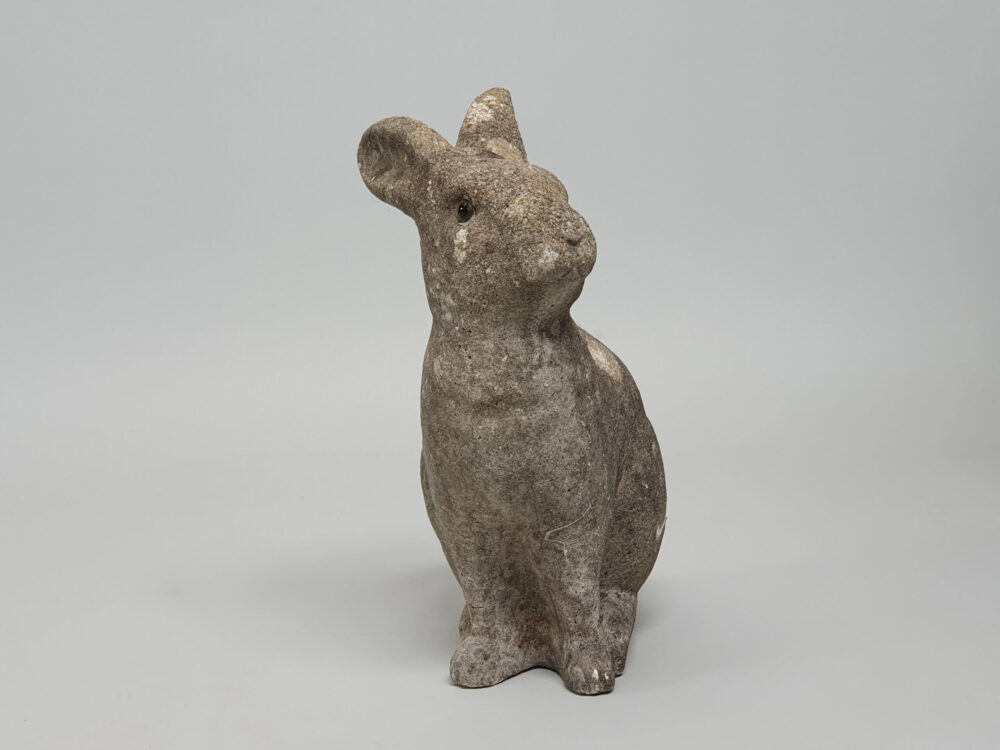 A well weathered Rabbit antique garden ornament