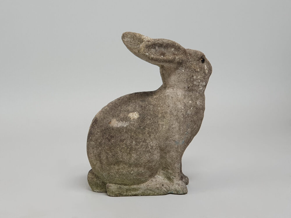 A well weathered Rabbit antique garden ornament