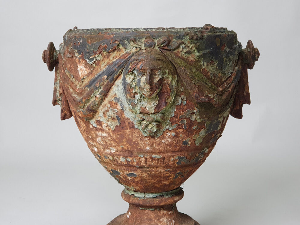 An Adam style 19th century antique garden urn with original paint