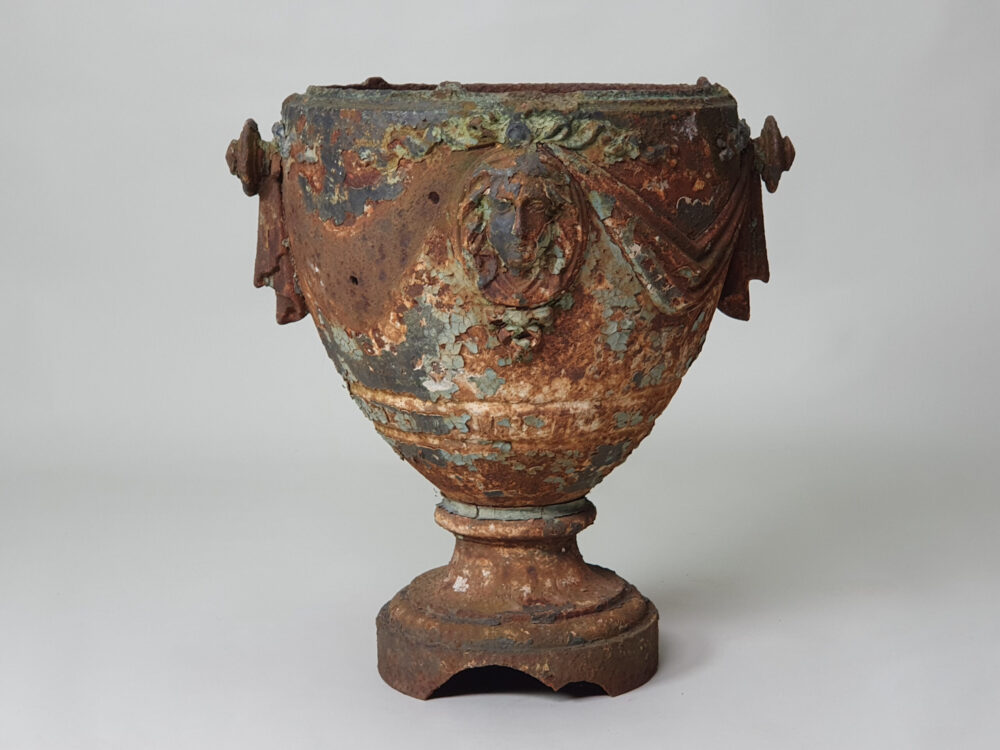 An Adam style 19th century antique garden urn with original paint