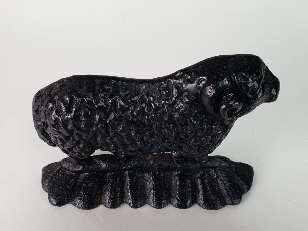 Antique cast iron matched pair of male and female Black Sheep