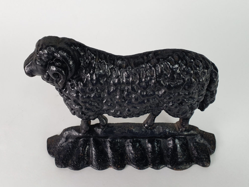 Antique cast iron matched pair of male and female Black Sheep