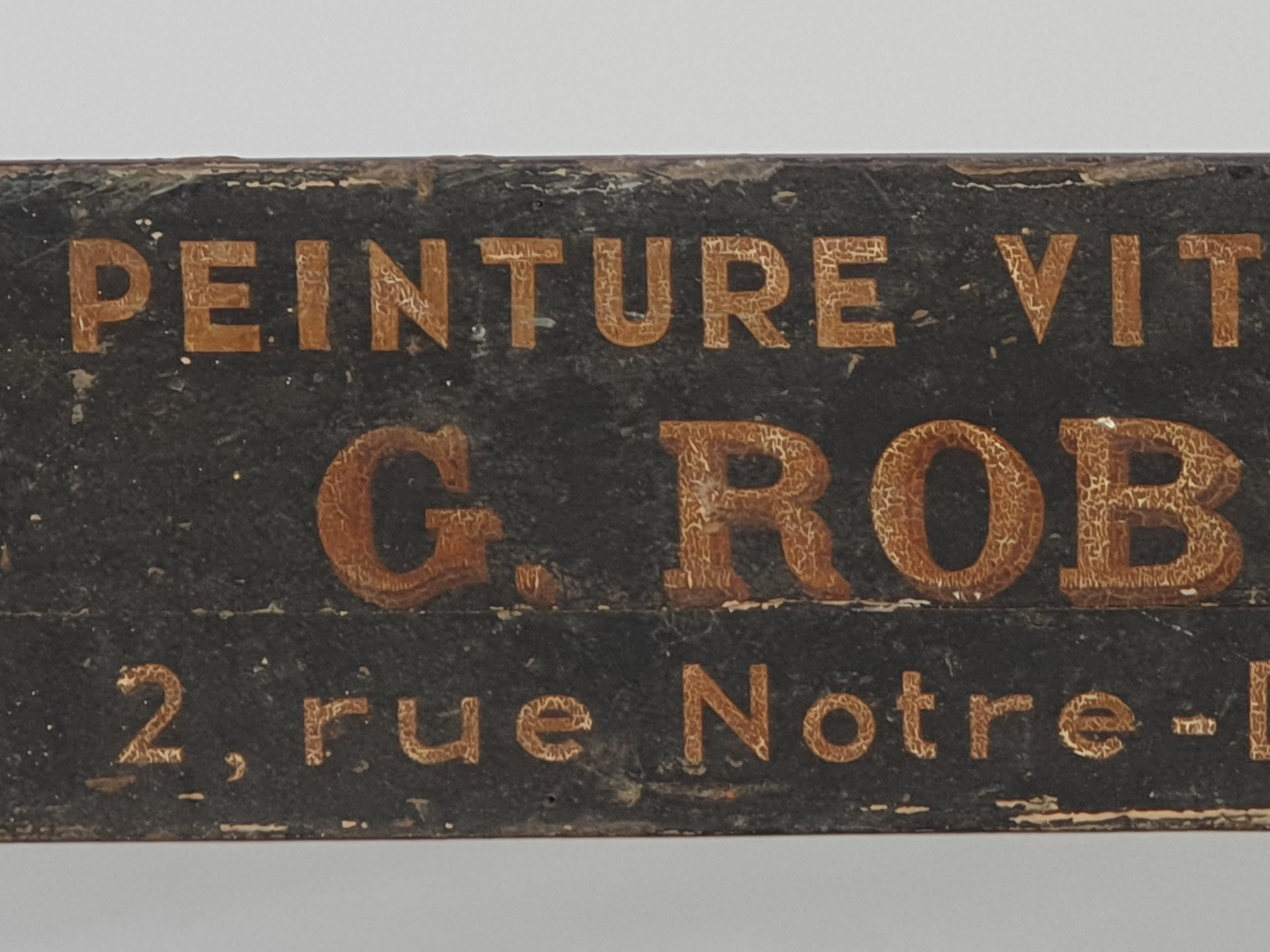 Antique hand painted Trade Sign close up