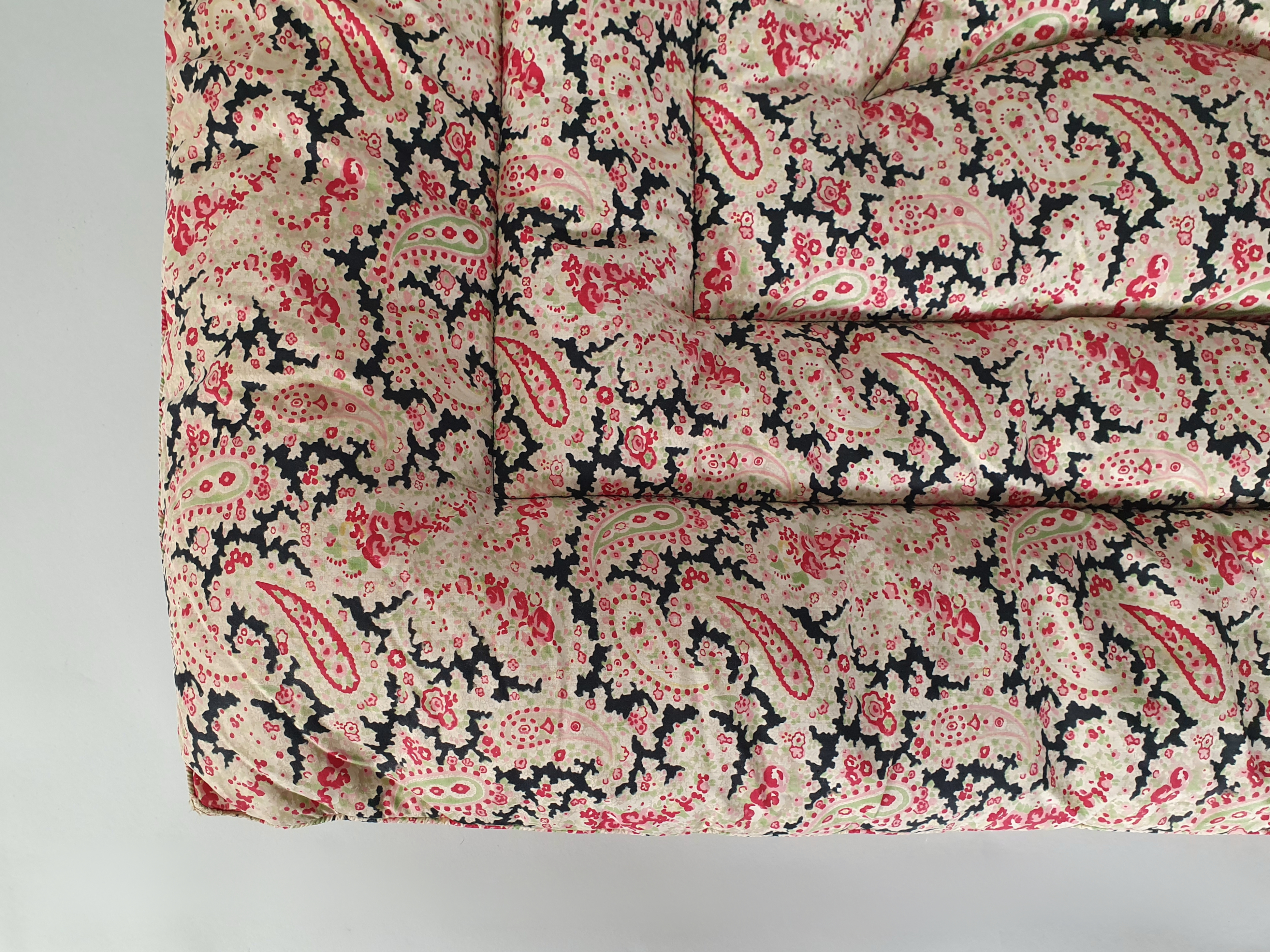 paisley eiderdown rolled up