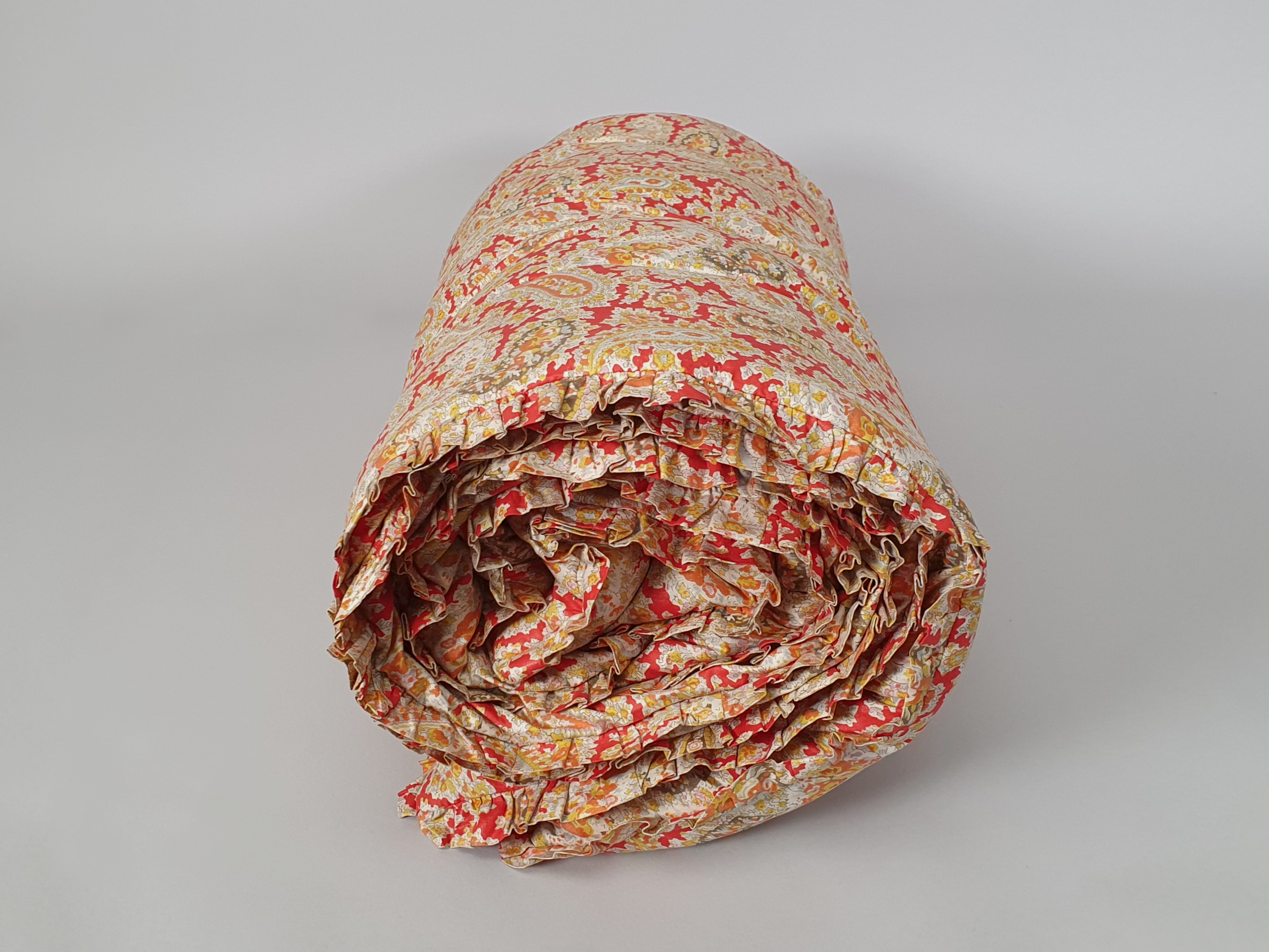 paisley eiderdown rolled up