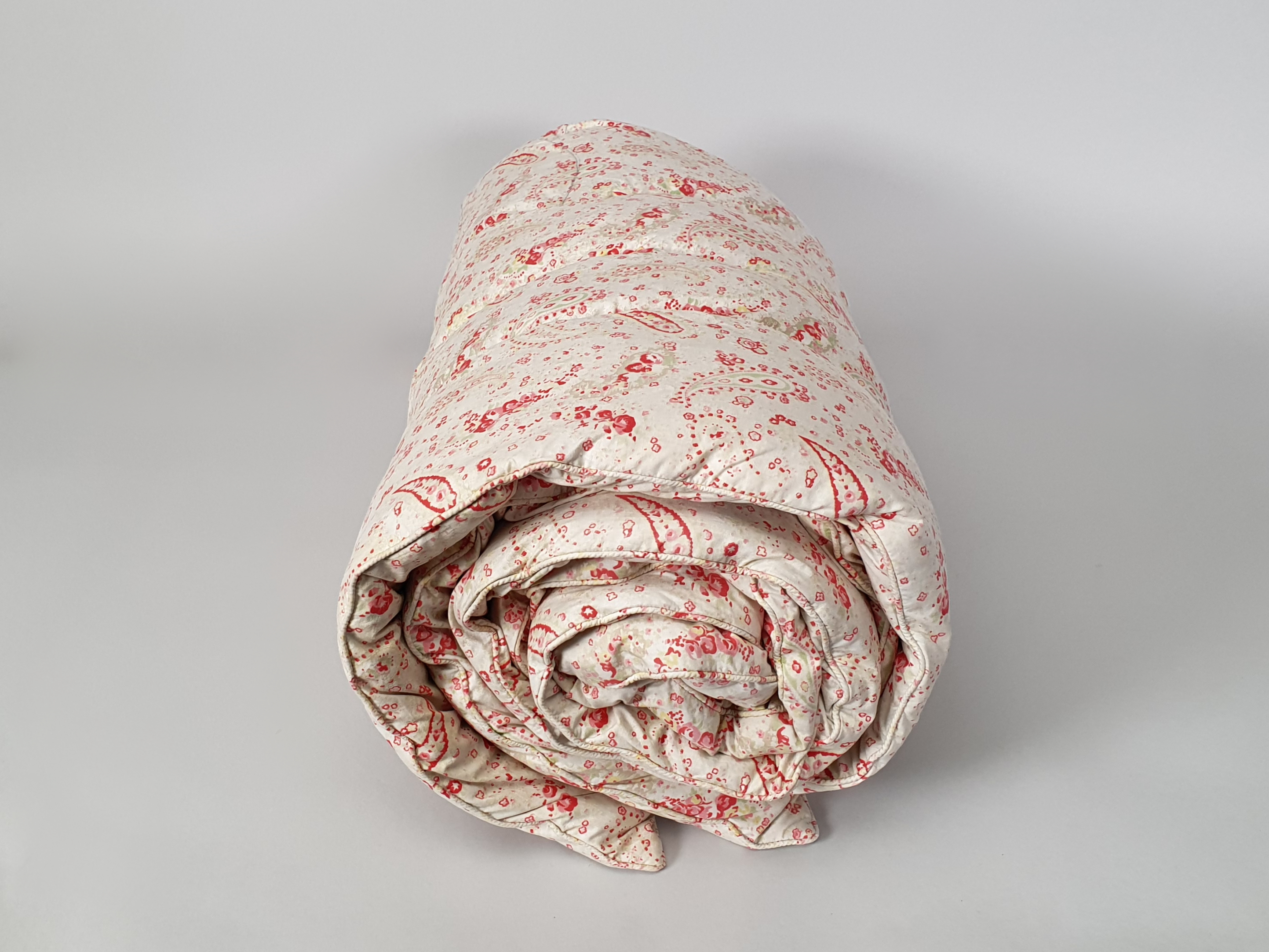 paisley eiderdown rolled up